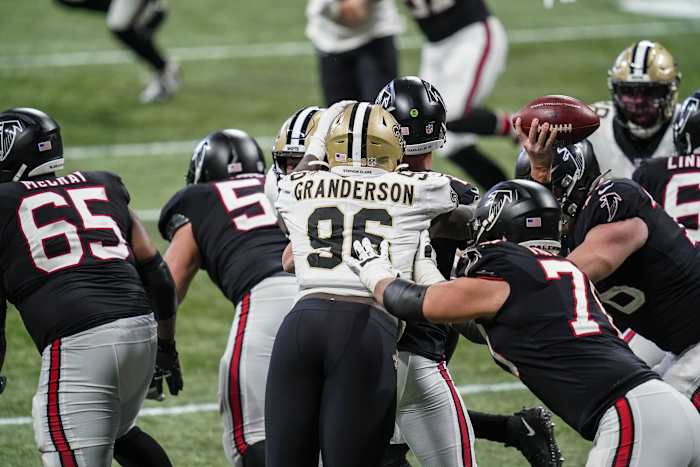 Saints defensive end Carl Granderson (96) hits Atlanta quarterback Matt Ryan (2) causing a fumble recovered by the Saints. Mandatory Credit: Dale Zanine-USA TODAY